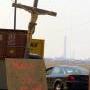  A Crucifix and a sign "Keep the Faith" greets residents and aid workers as they enter a National Guard Check point in Chalmette