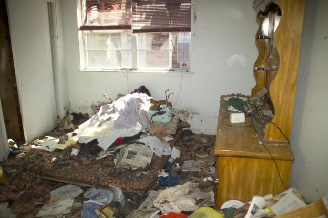 Roger and Ellen's bed room after the storm 
