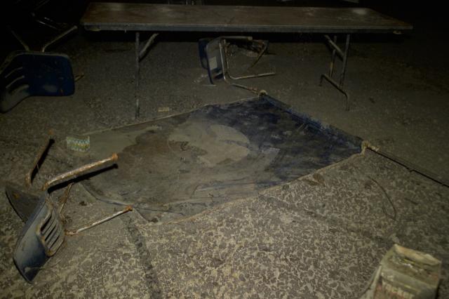 Louisiana State flag as it was left by Katrina in the school's cafeteria 