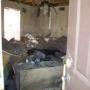 Water completely submerged the first floor of Shirley's apartment (9+ feet). Note the over foot of mud on the floor. 