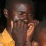 The Men of Eldoret praying during the Crusade 
