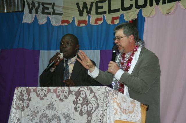 Pastor Terry and translator Pastor Solomon preaching to the congregation of the Hope of Salvation church 