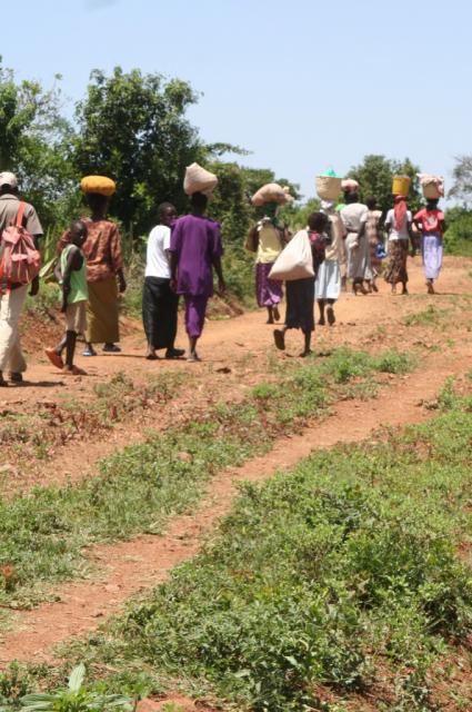 The woman of Homa-bay start making their way home carrying food for their families 