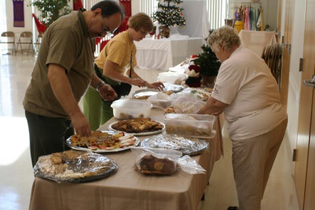  Team members getting the cookies ready for the Christmas party in Metairie, LA. 