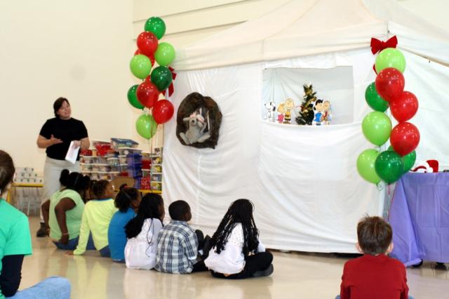 Michele Kabay and the kids receive a visit from Thumper the rabbit together they narrate the story of Charlie Brown's Christmas