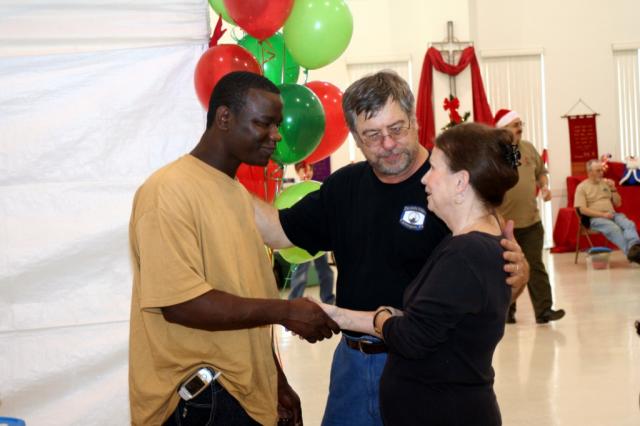  Terry (middle) introduces these two families to each other so they can help each other. What an honor to be party of God's plan