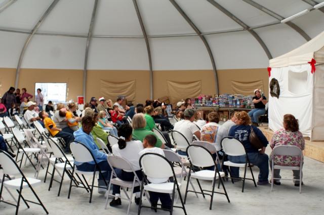 Michele Kabay read the Christmas story to the crowd in Chalmette, LA. 
