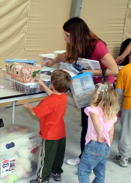 A family receives their gifts. 