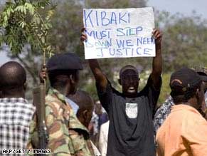 An Odinga supporter displays a sign during a march in Kisumu, Kenya